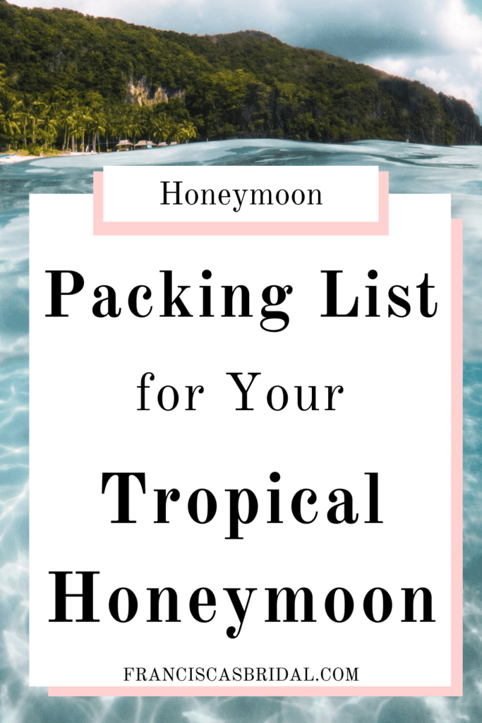 Aqua clear ocean water with palm tress in the background with text over the photo that says packing list for your tropical honeymoon.