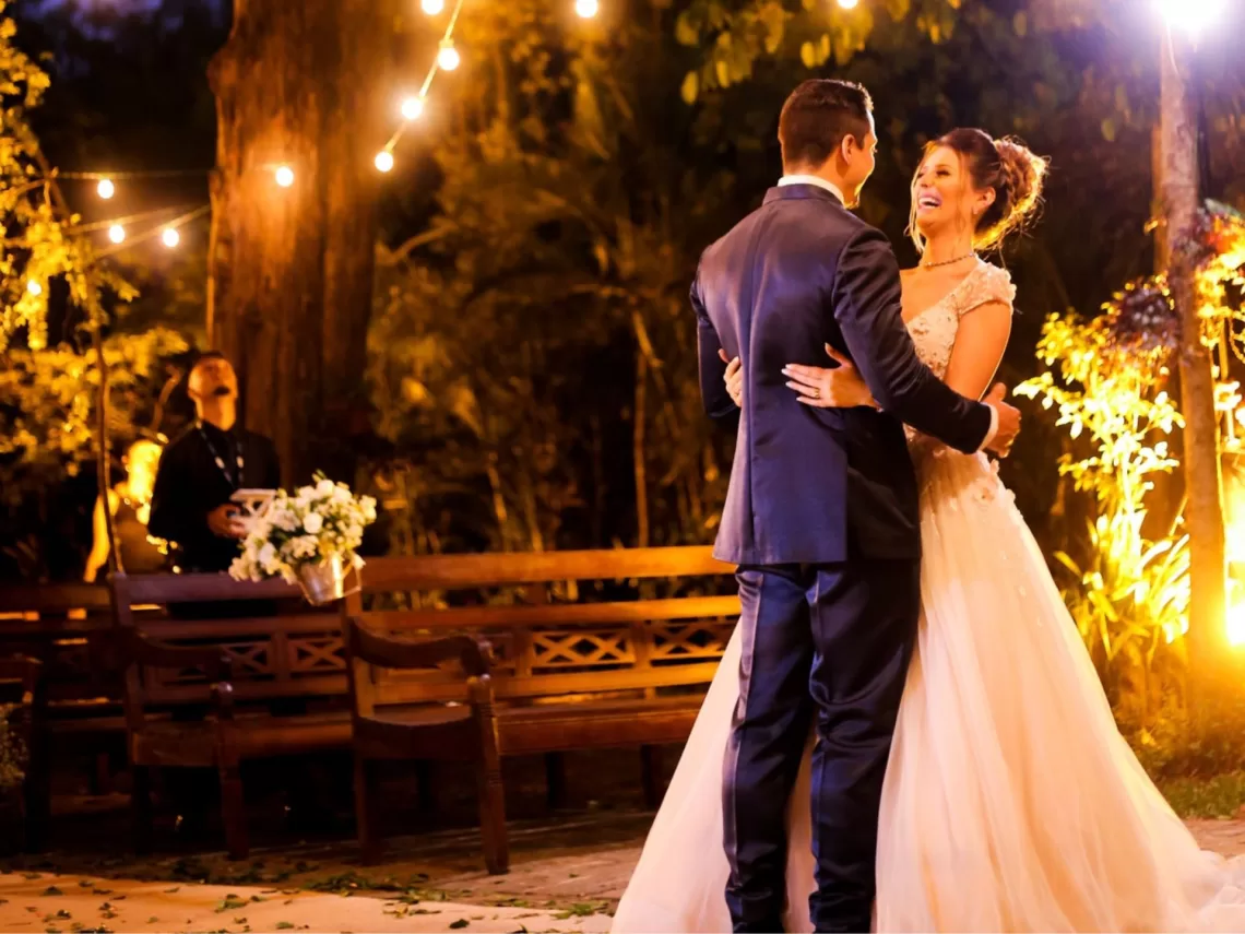 A bride and groom having their first dance at their wedding.