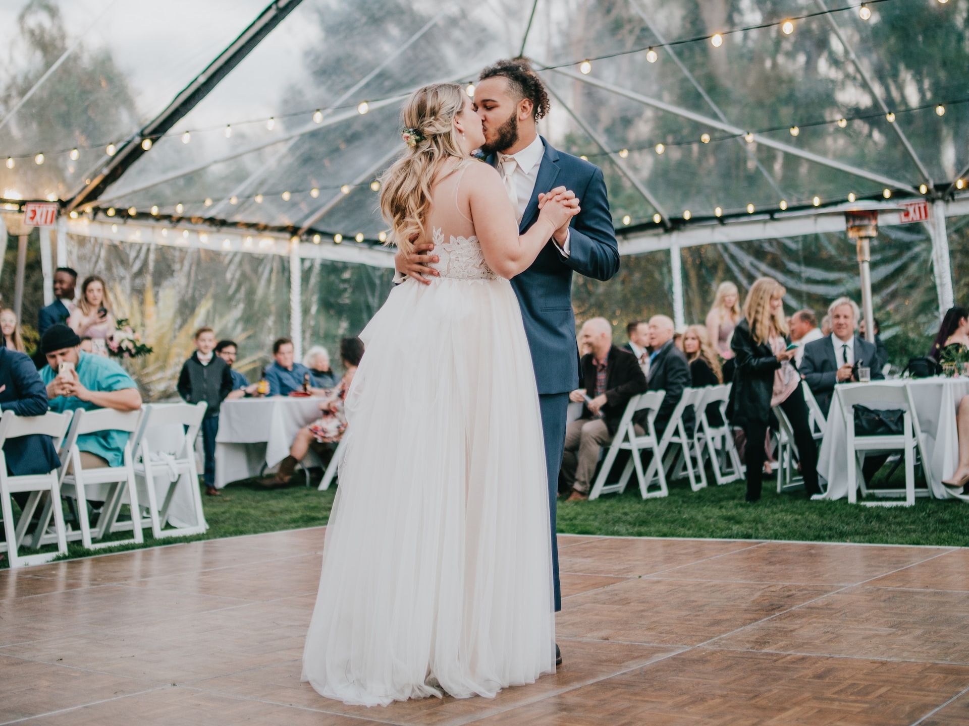 A bride and groom dancing.