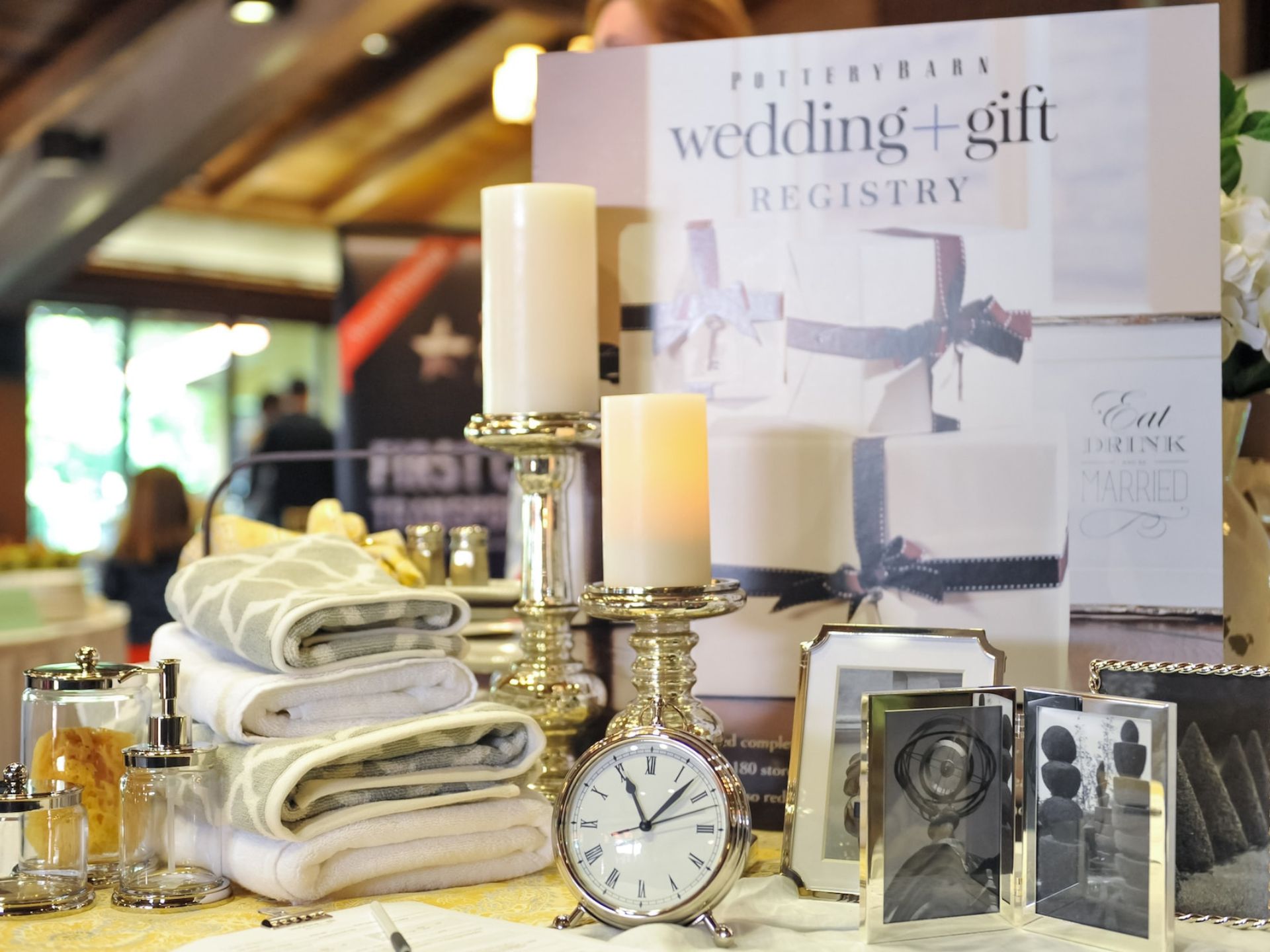 A table filled with wedding gifts.
