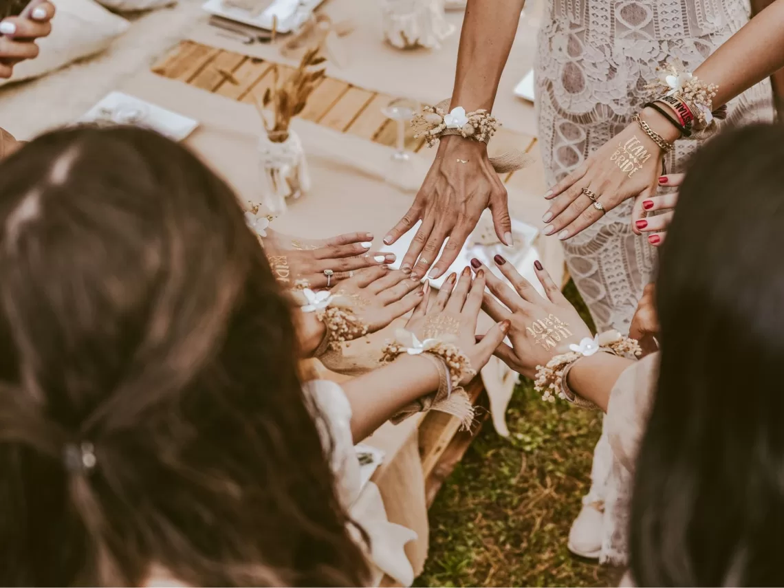 A bride and her bridesmaids at a bachelorette party.