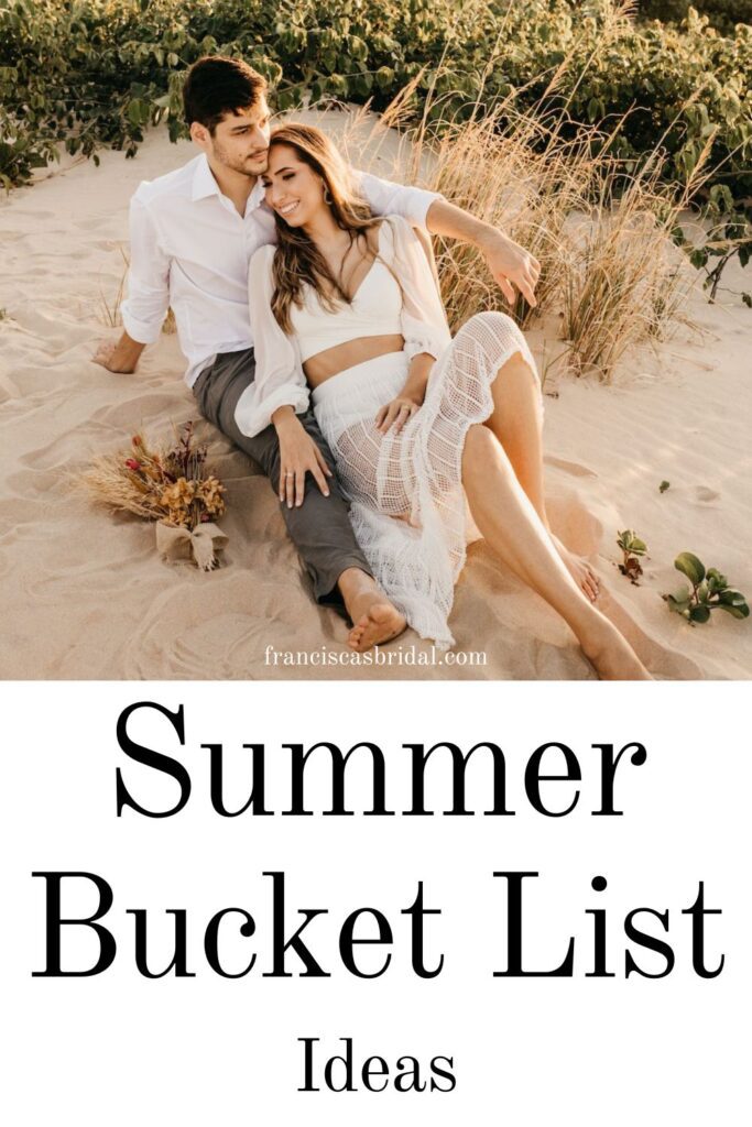 A couple lying on the beach with text that says july summer date ideas.