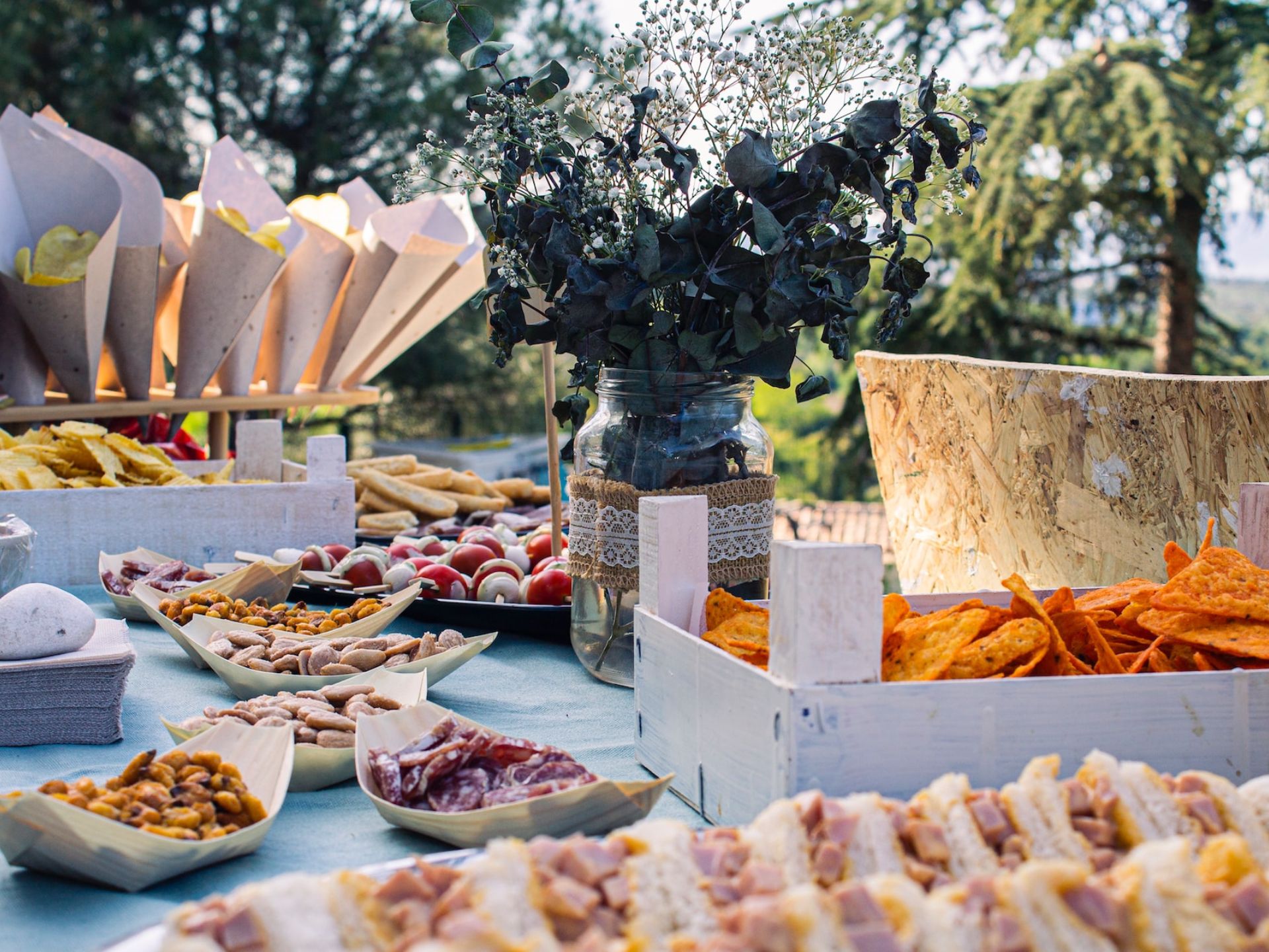 A wedding table filled with finger food.