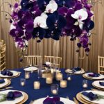 A purple orchid table centerpiece.
