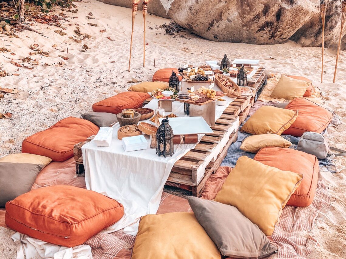 A fall themed picnic bachelorette party on the beach.