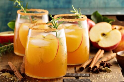 A tray with 3 hard apple cider cocktails.