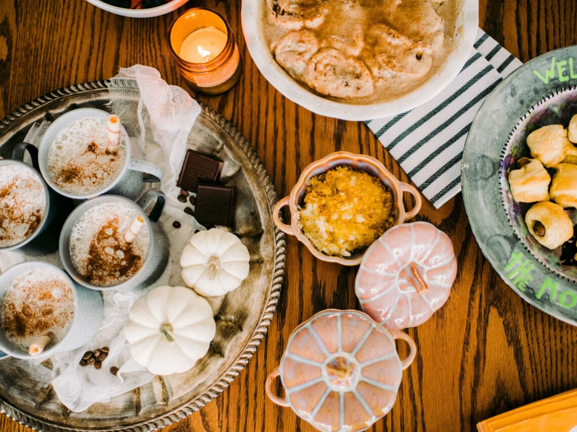 A fall dinner on a wooden table.