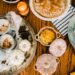 A fall dinner on a wooden table.