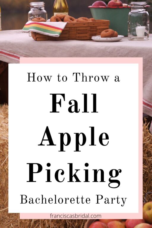 A picnic table with apples and cider that has the text fall themed bachelorette party ideas.