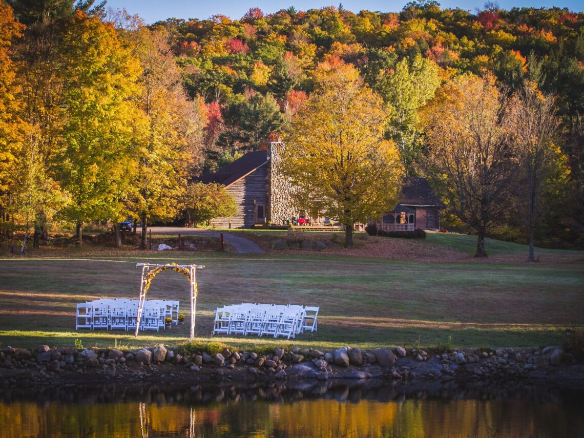 A lakeside fall themed wedding ceremony.