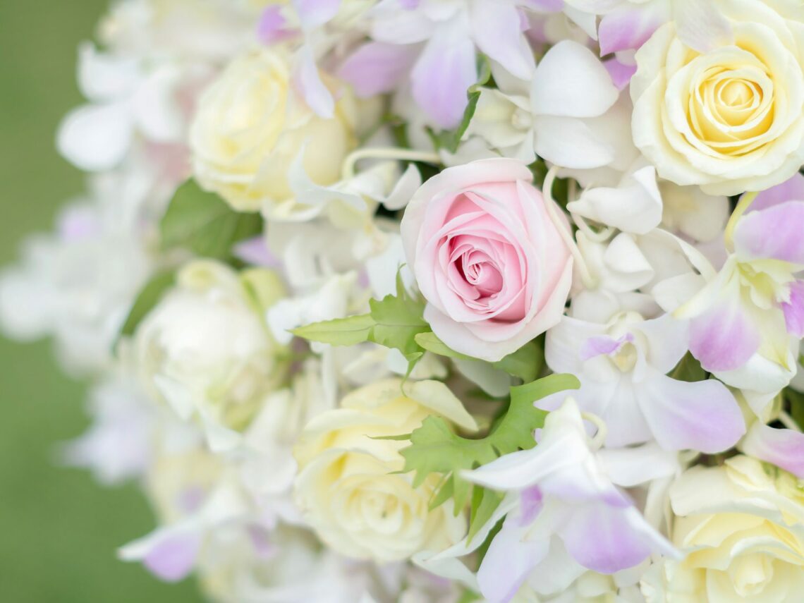 A bouquet of pastel colored flowers.