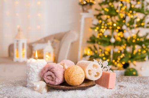 A spa table with a christmas tree in the background.