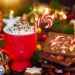 A table with hot chocolate and Christmas candy bark.