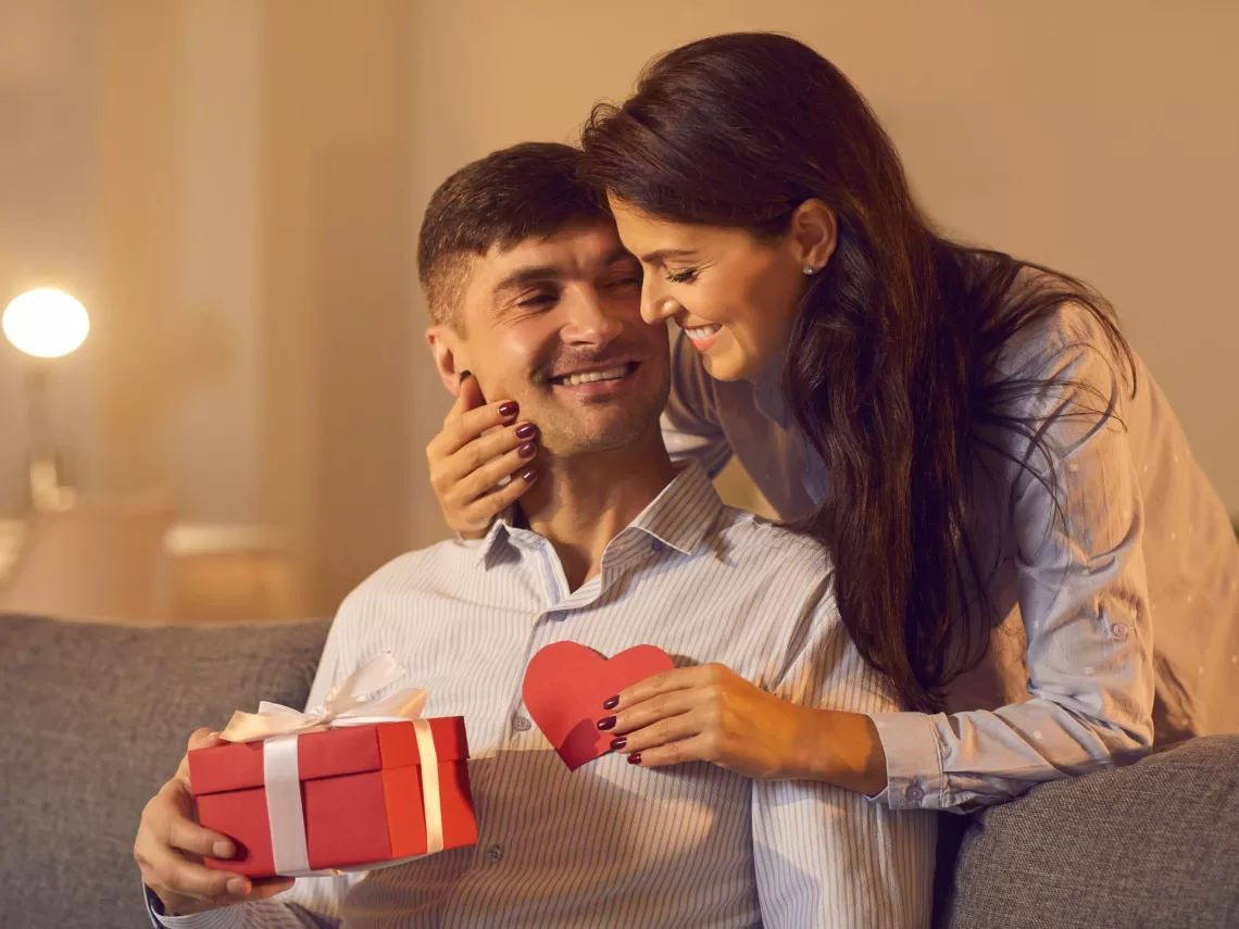 A couple exchanging valentine's day gifts.