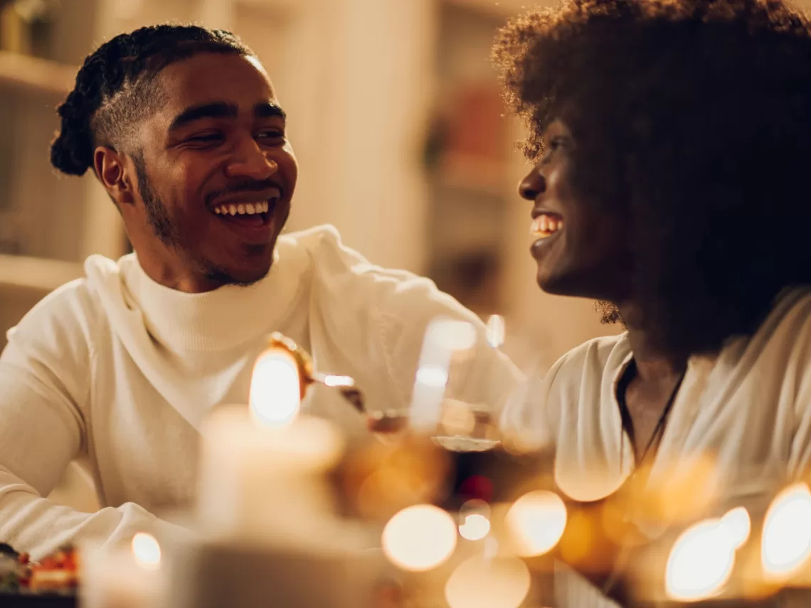 A couple having dinner and wine together.