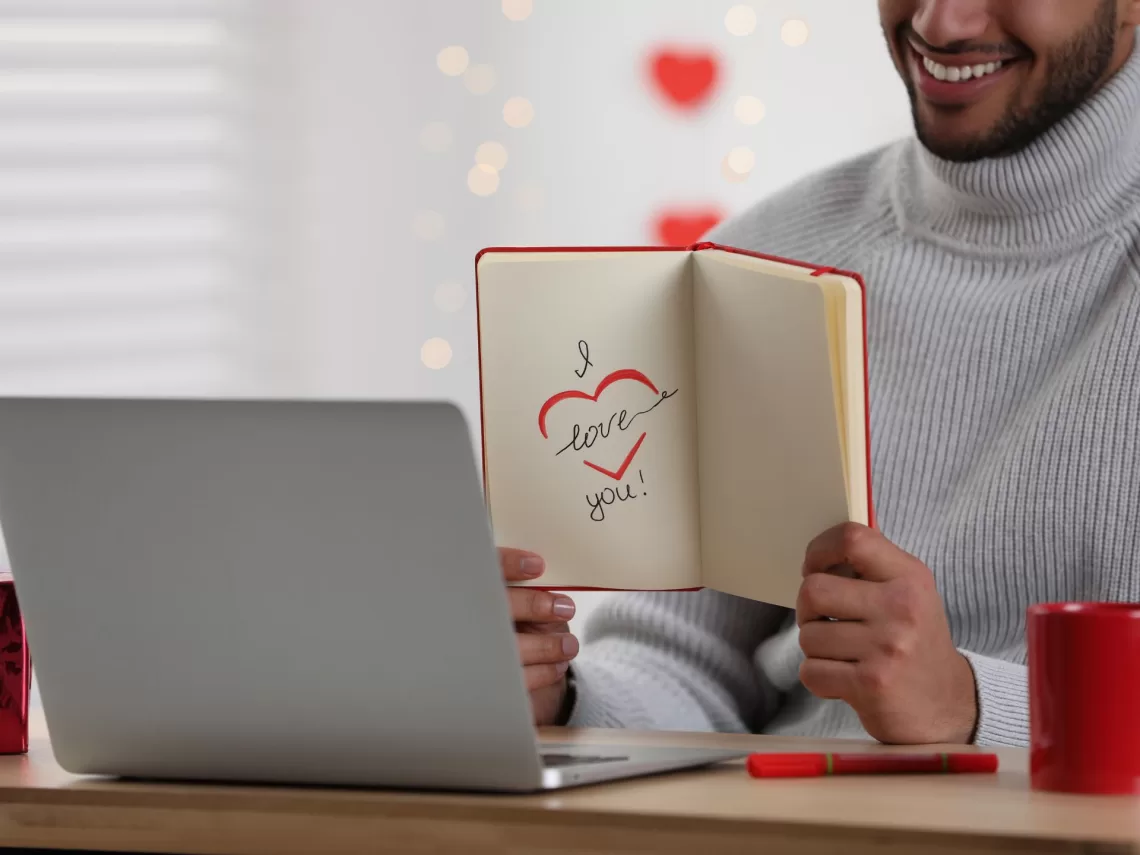 A couple facetiming on valentine's day.