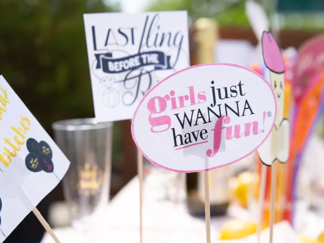 A bachelorette dessert table with naughty decor.